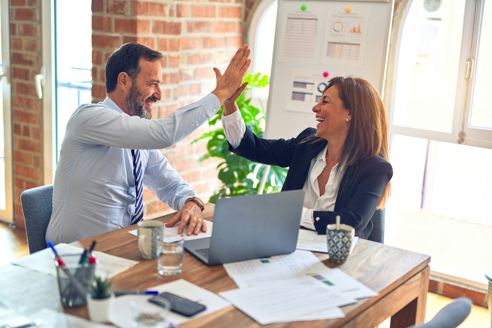 Founders collaborating on brand strategy